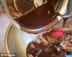 Pour the melted chocolate goodness over the Tim Tam and coconut mixture and mix well