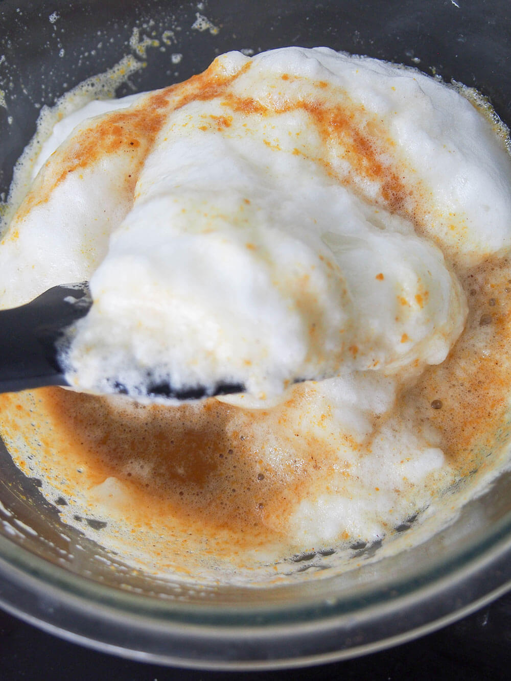 mixing pumpkin souffle